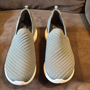 Skechers slip ons.  Olive green in color.